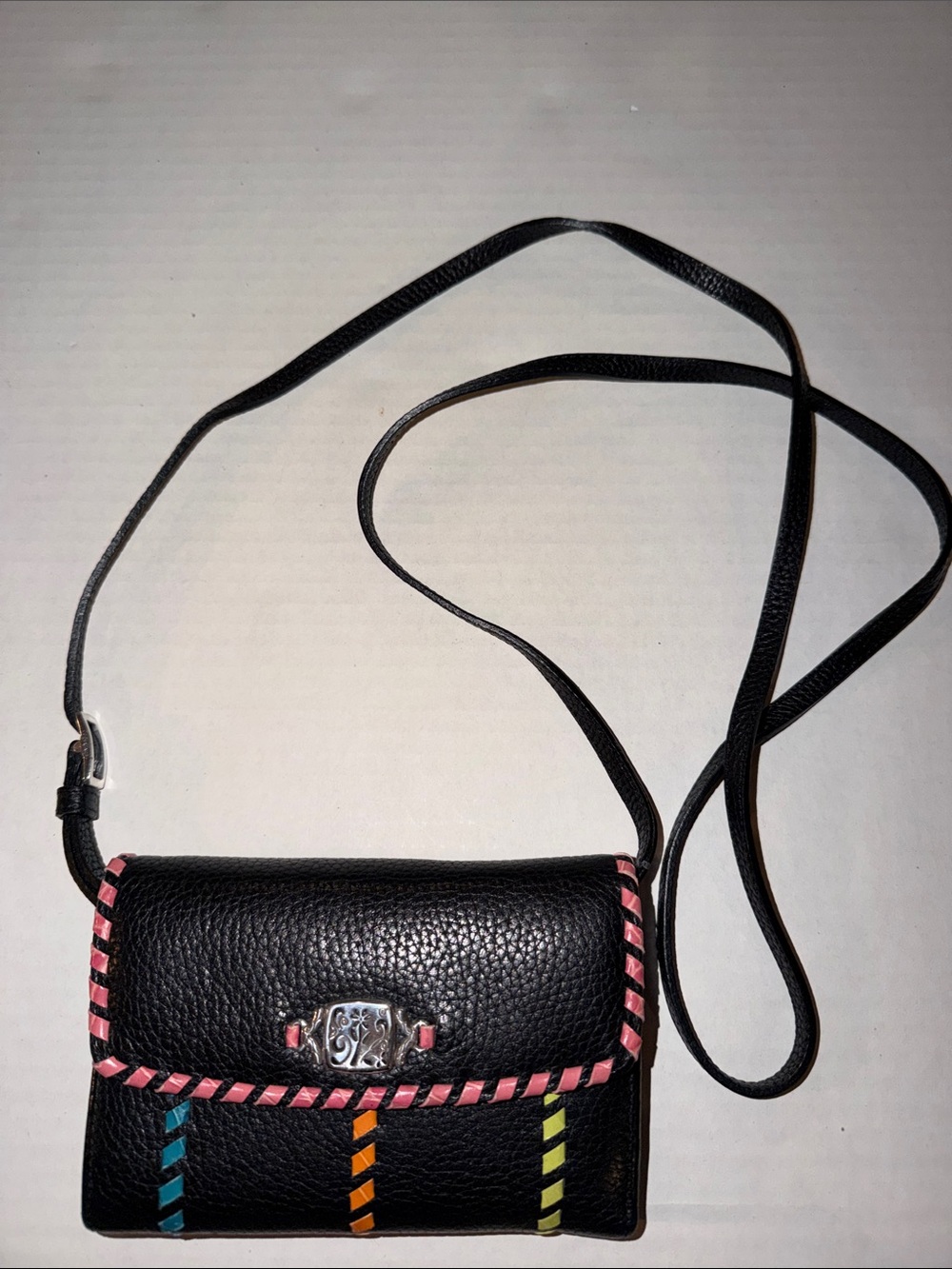 Brighton Black Crossbody Wallet with Pink Whipstitch and Multicolor Stripes